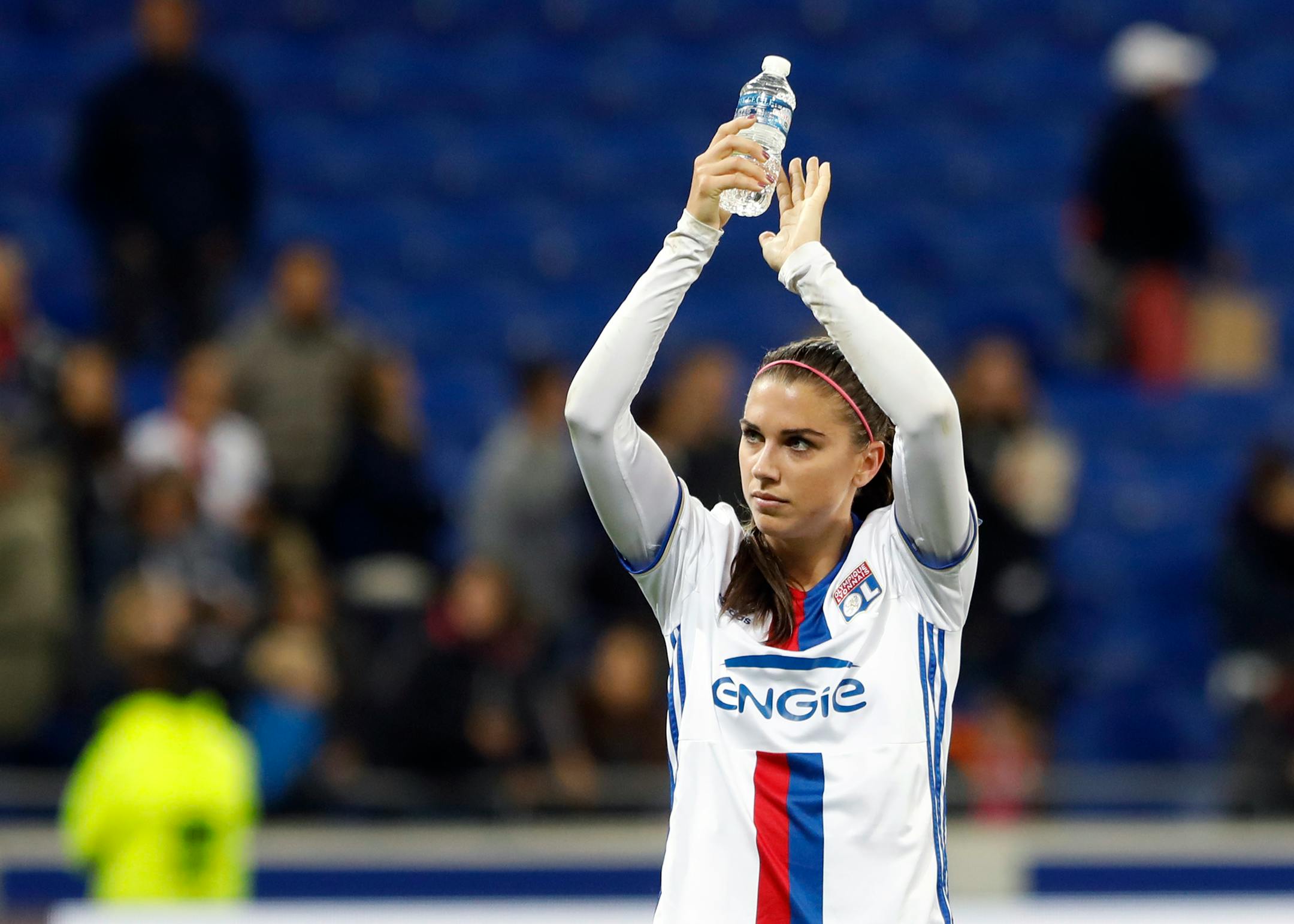 Lyon's Alex Morgan celebrates after they won their Women's Champions League semifinal soccer match against Manchester City in Decines, near Lyon, central France, Saturday, April 29, 2017. (AP Photo/Laurent Cipriani)