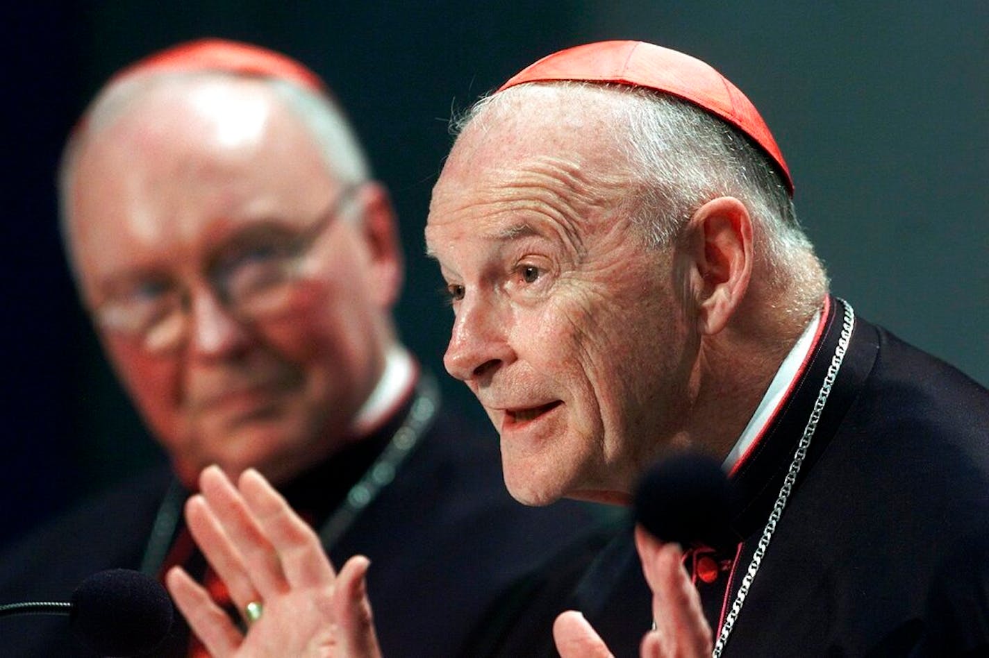 Washington Cardinal Theodore Edgar McCarrick, right, flanked by head of the Pontifical Council for the Laity at the Vatican Cardinal James Francis Stafford, speaks at an April 2002 news conference at the Vatican concluding a two-day meeting between Pope John Paul II and U.S. cardinals at the Vatican.