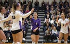 Ellie Meyer celebrates a point with teammates during the MIAC Championship volleyball game against St. Olaf in the Anderson Athletic and Recreation Ce
