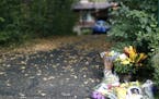 A photograph of Jacob Wetterling and flowers were placed at his parents home Sunday September 4,2016 in St. Joseph, MN.] Jerry Holt / jerry. Holt@Star