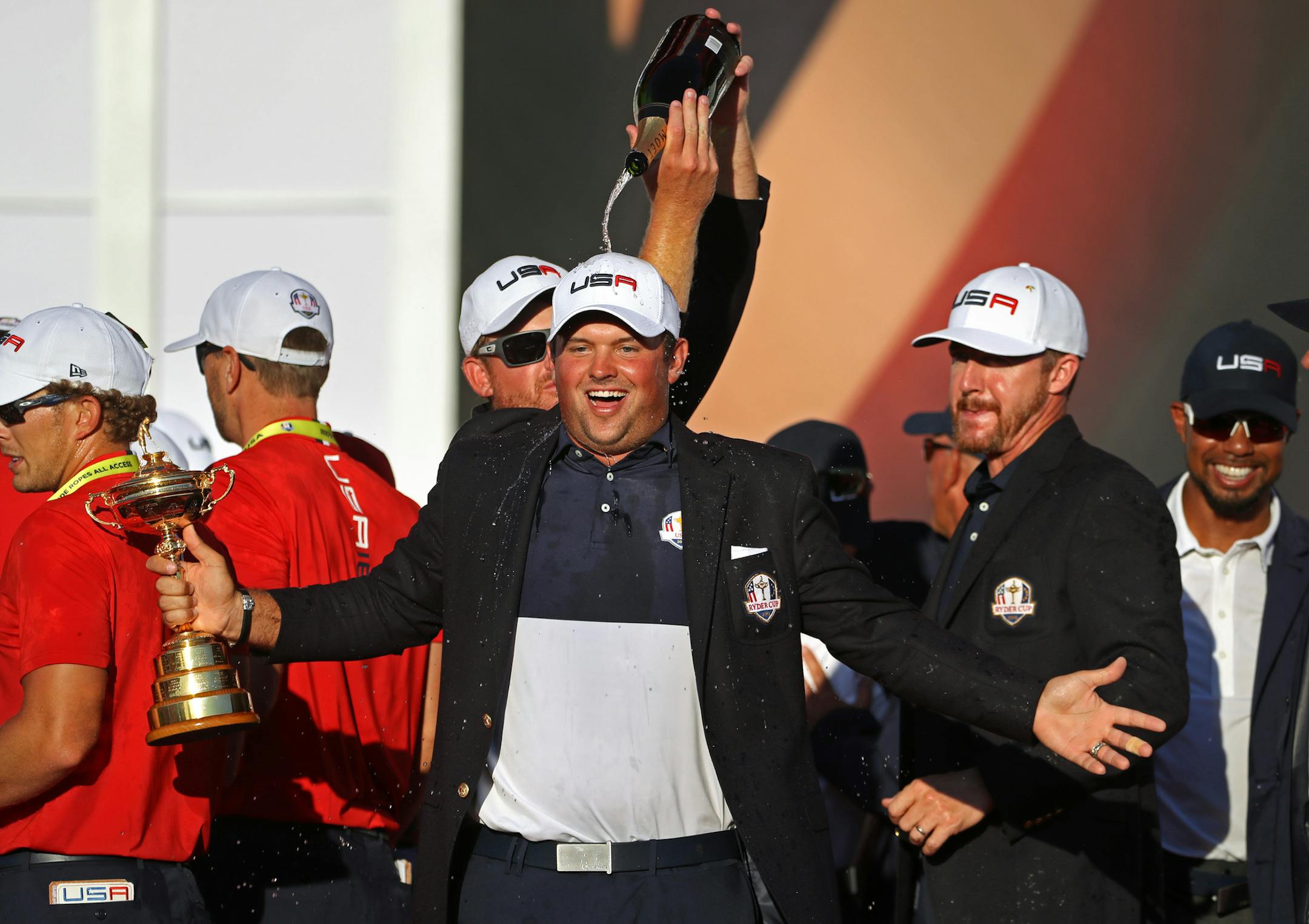 Patrick Reed with the cup and a champaigne shower by Ryan Moore. ] 2016 Ryder Cup, Hazeltine National Golf Club.
brian.peterson@startribune.com
Chaska, MN 10/02/16
