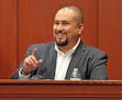 George Zimmerman smiles as he testifies in a Seminole County courtroom in Orlando, Fla, in 2016.