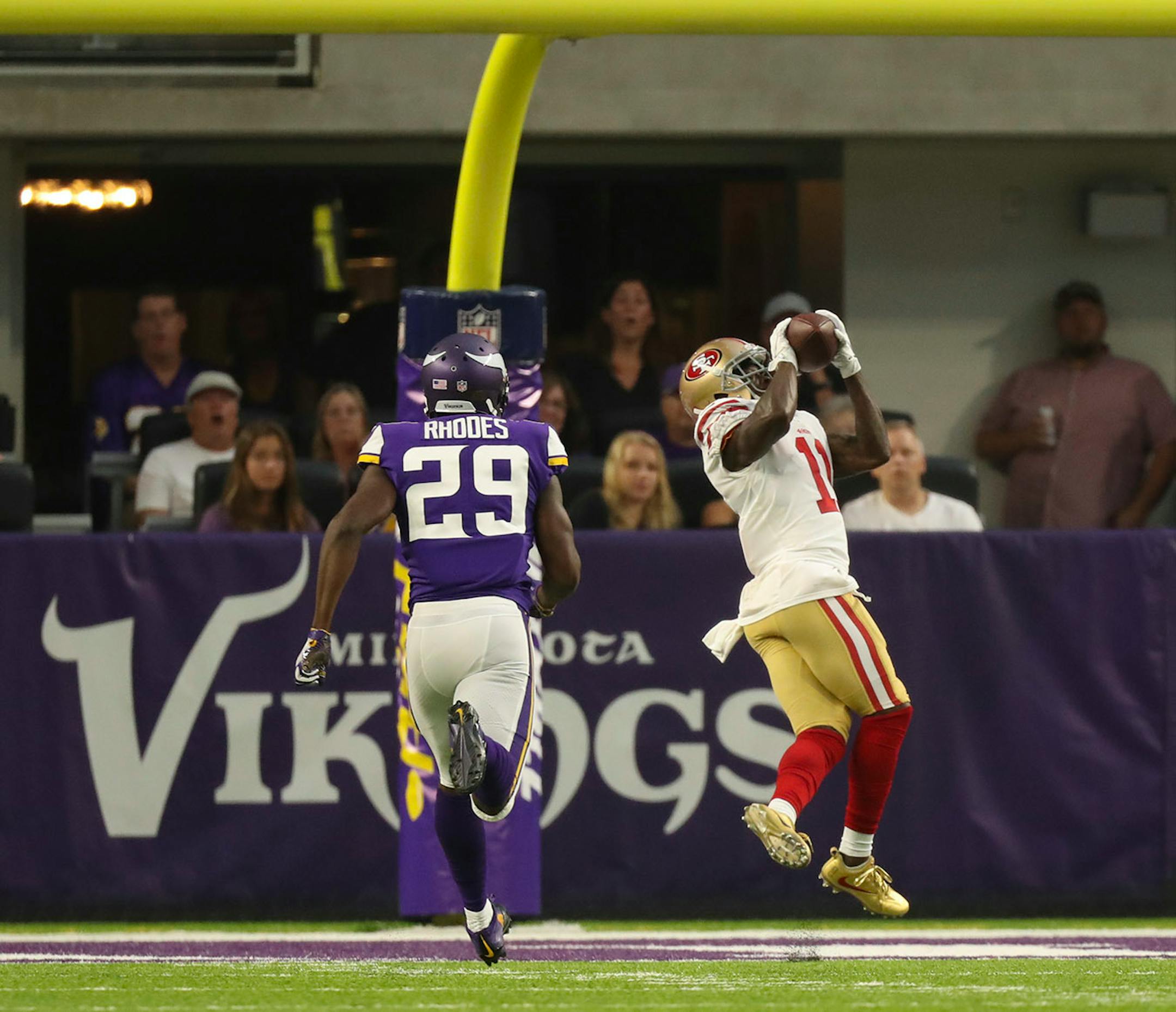 San Francisco 49ers wide receiver Marquise Goodwin (11) caught a 46 yard touchdown pass in the first quarter while out in front of Minnesota Vikings cornerback Xavier Rhodes (29).
