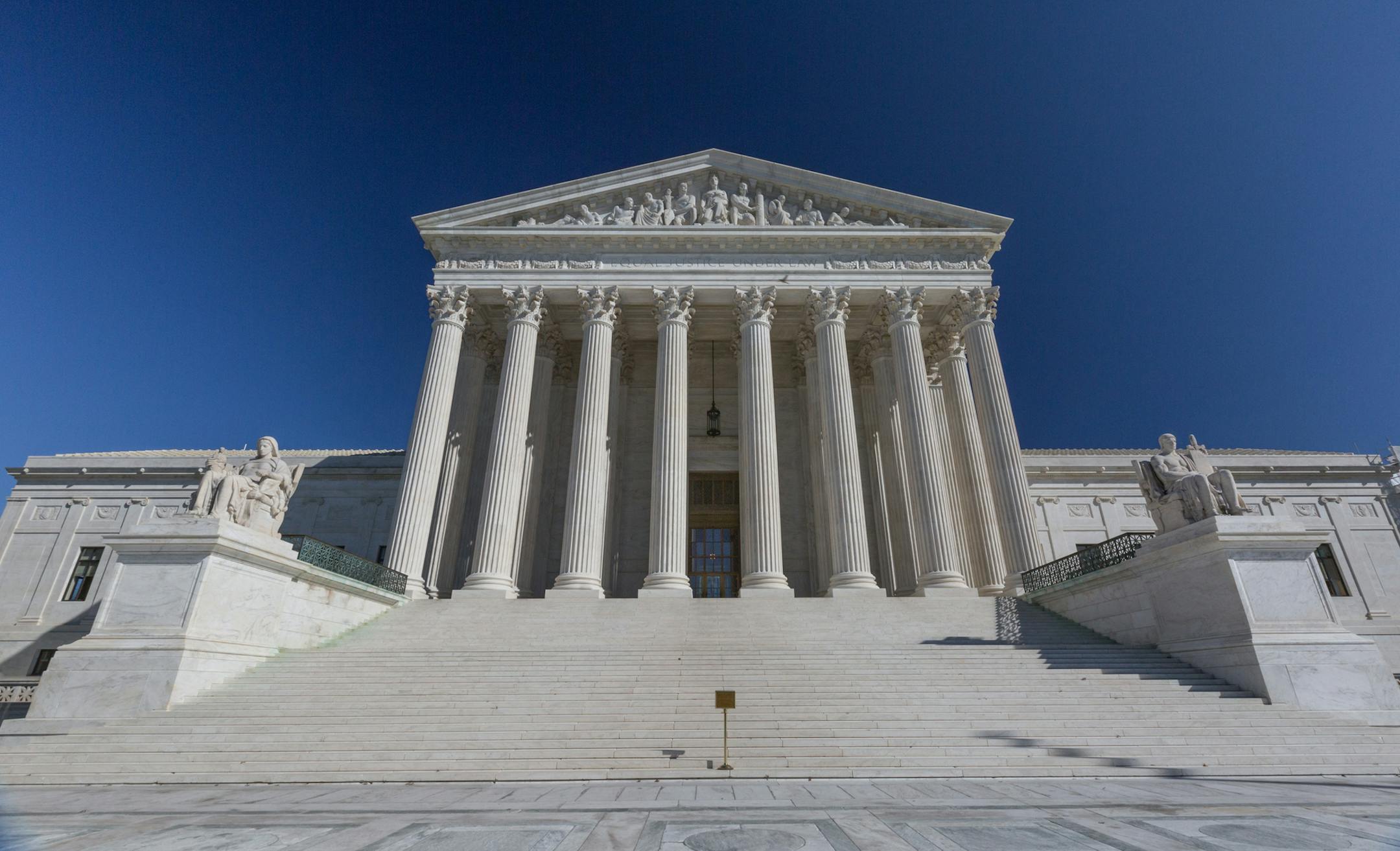 Low wide angle view of the U.S. Supreme Court Building in Washington, DC.