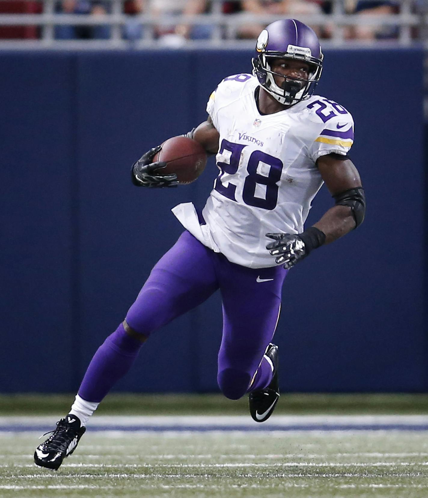 Minnesota Vikings running back Adrian Peterson (28) during a run in the third quarter. ] CARLOS GONZALEZ cgonzalez@startribune.com - September 7, 2014, St. Louis, MO, NFL, Edward Jones Dome, Minnesota Vikings vs. St. Louis Rams