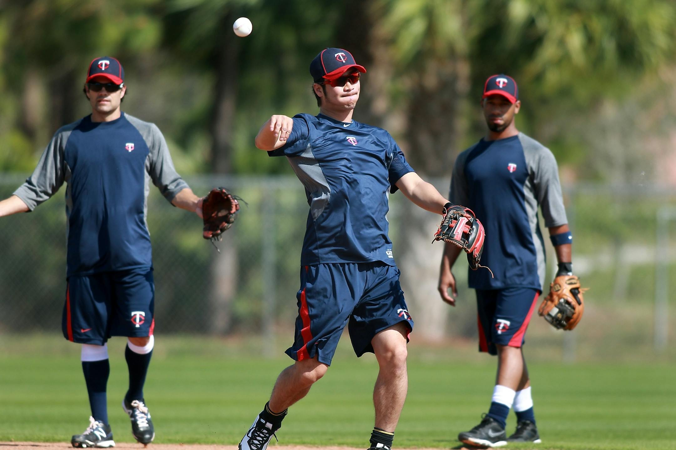 Minnesota Twins Tsuyoshi Nishioka fielded balls during practice at Hammond Stadium.