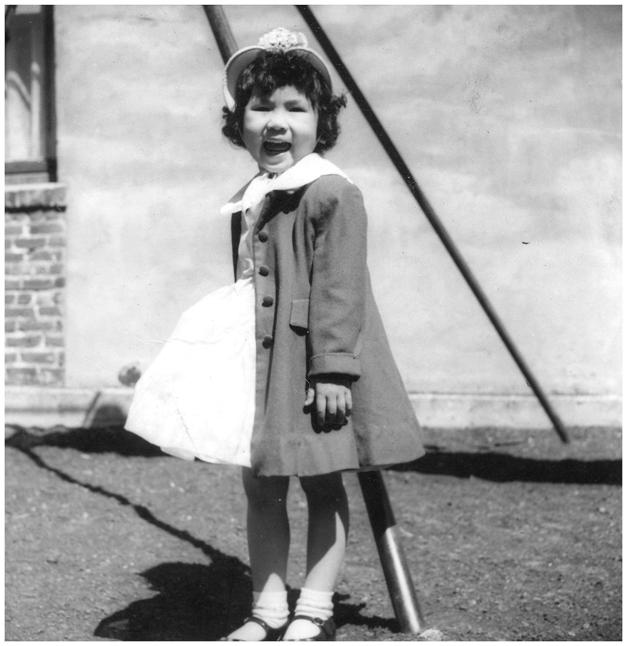 Amy Tan at age 3, posing for her father's Rollei.