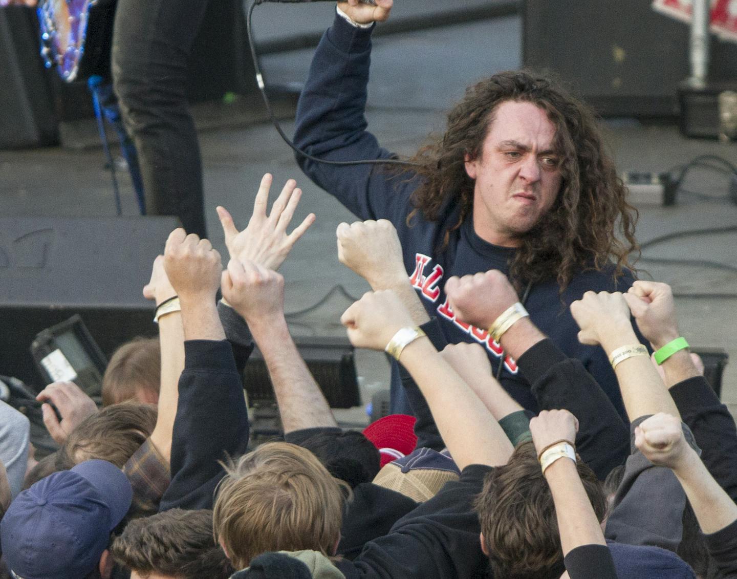 Lead Singer Lee Spielman insights the crowd as Trash Talk performs on the main stage at Doomtree Zoo.