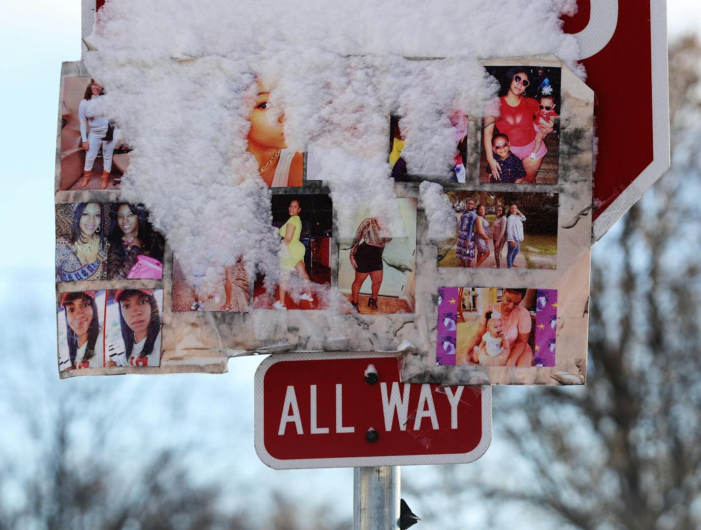 Police say that gang members and others have erected barriers around the No-Go Zone at 38th/Chicago and are cruising the area while armed and intimidating residents. Here, photos of Leneesha Columbus, 27, coat a stop sign at 37th St. E. and Elliott Ave. near George Floyd Square and seen Wednesday in Minneapolis. Columbus was shot and killed earlier in the summer while six months pregnant by her boyfriend. ] DAVID JOLES • david.joles@startribune.com Wednesday, Nov. 11, 2020, in Minneapolis, MN. A