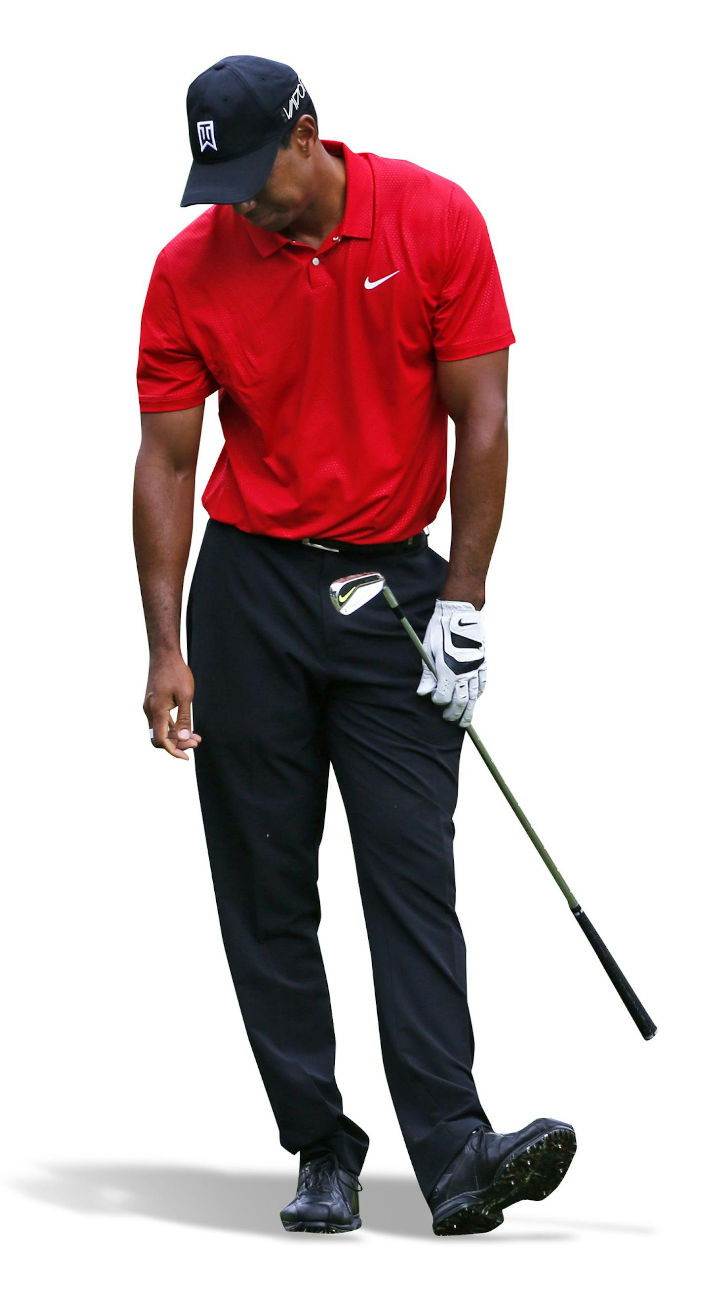 Tiger Woods looks down after his second shot on the seventh hole during the final round of the Greenbrier Classic golf tournament, Sunday, July 5, 2015, at the Greenbrier Resort in White Sulphur Springs, W.Va. (AP Photo/Steve Helber) ORG XMIT: WVSH108