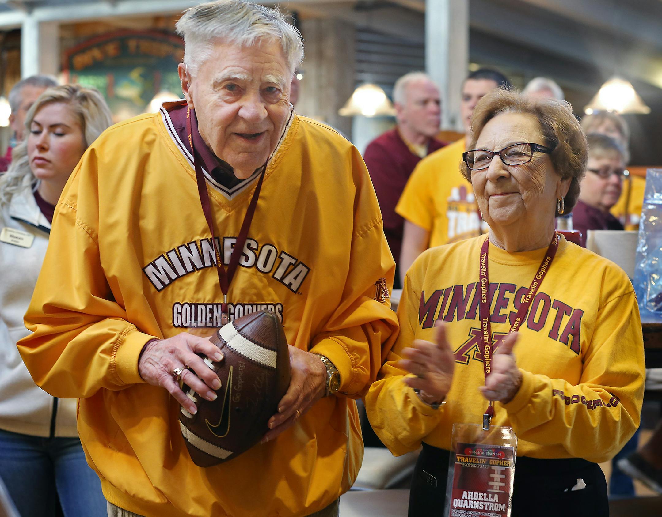 Minnesota head football coach Tracy Claeys made a surprise appearance as he presented first time bowl visitors Warren and Ardella Quarnstrom with a football during a breakfast, Tuesday, December 27, 2016 in San Diego, CA. The couple, both 91, made their first time football bowl trip from Marshall, MN. They have been married more than 66 years. ] (ELIZABETH FLORES/STAR TRIBUNE) ELIZABETH FLORES &#x2022; eflores@startribune.com