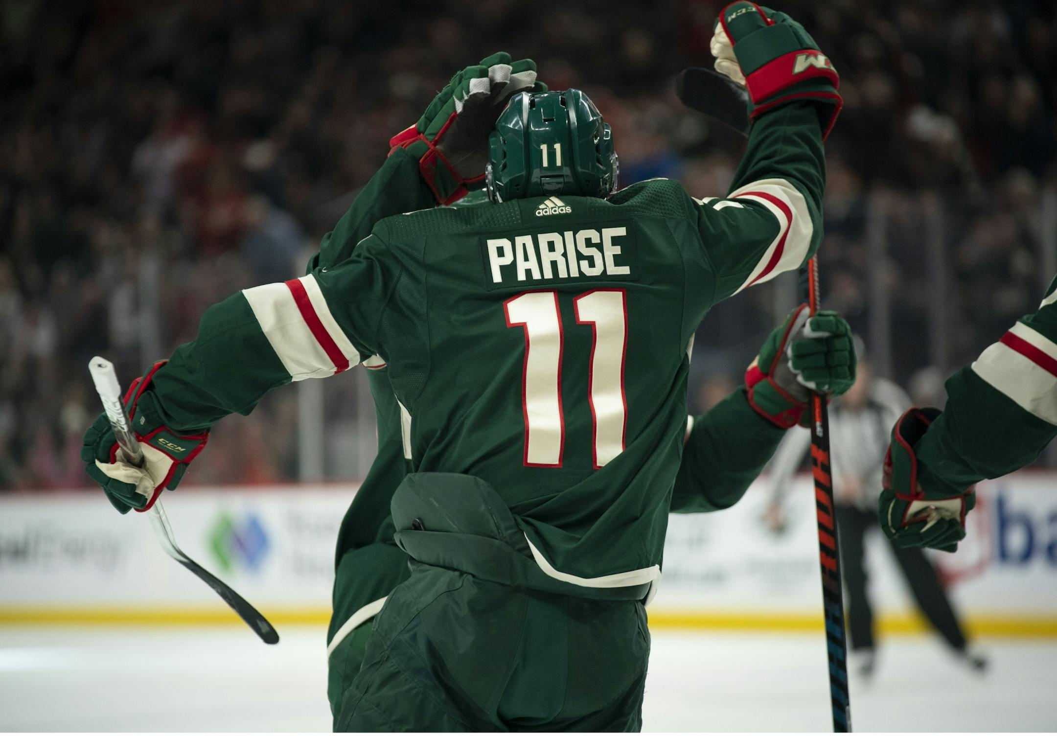 Minnesota Wild left wing Zach Parise (11) celebrated his first period goal.
