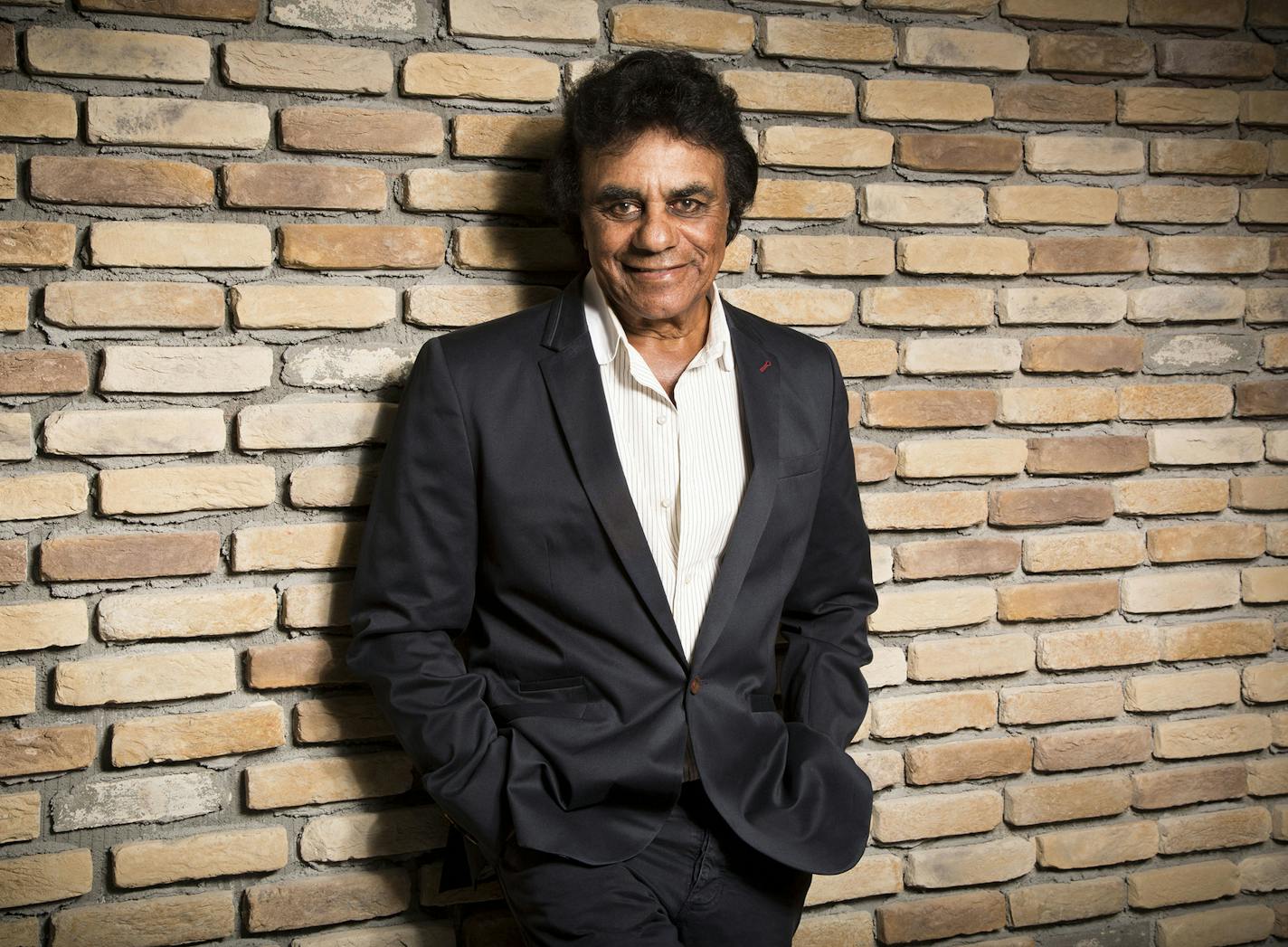 Singer Johnny Mathis poses for a portrait on Monday, Sept. 8, 2014, in Los Angeles, Calif. (Photo by Omar Vega/Invision/) ORG XMIT: CAOV104