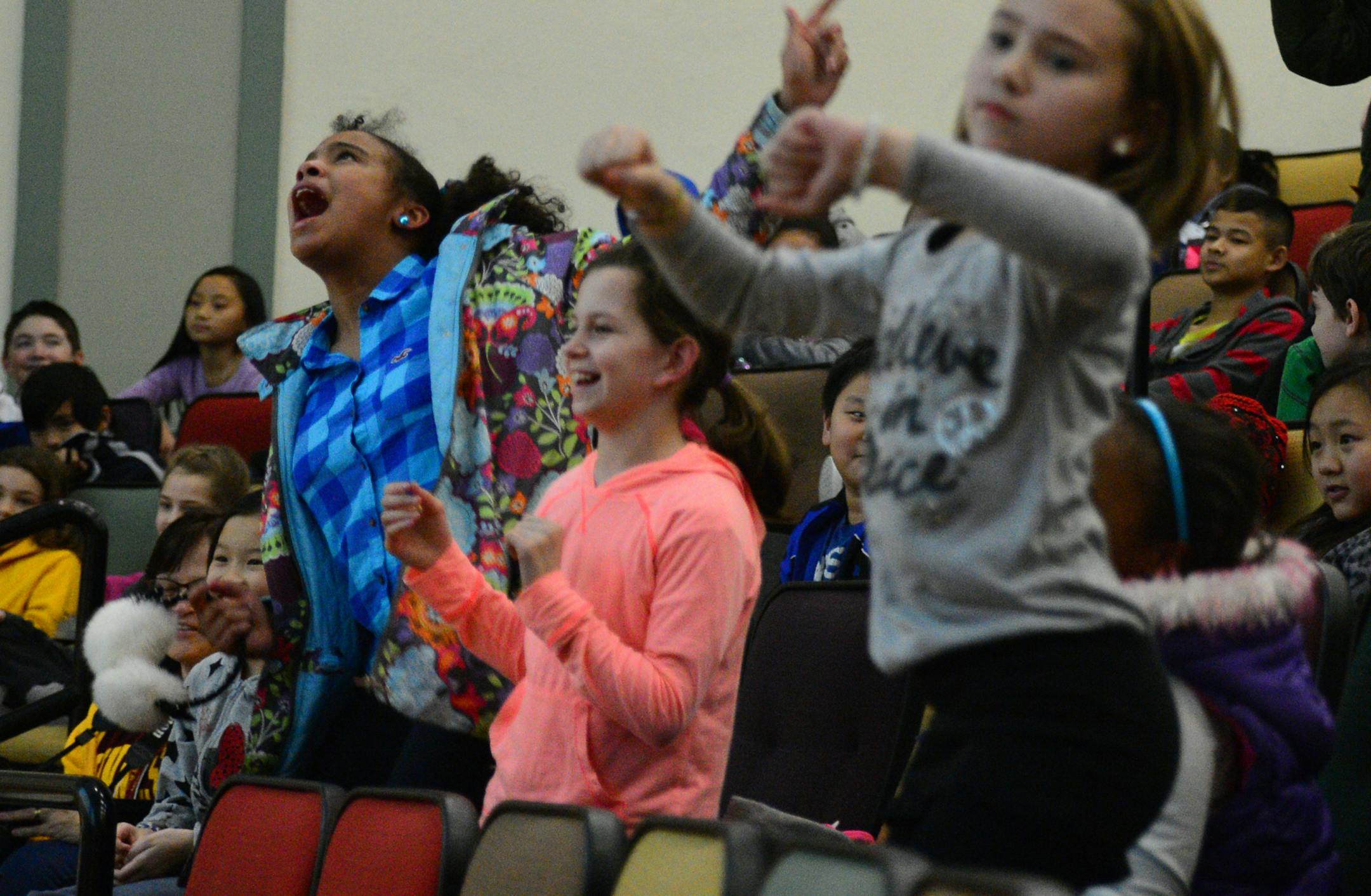 Students were encouraged to dance every time before things were blown up. .Explosions, flames, rock music and screaming gummy bears are all part of a unique and fun University of Minnesota College of Science and Engineering outreach program that aims to interest elementary school students in science. With three shows a day for five days, more than 5,000 students were expected at January's Energy and U shows at Smith Hall . ] Richard.Sennott@startribune.com Richard Sennott/Star Tribune Minneapoli
