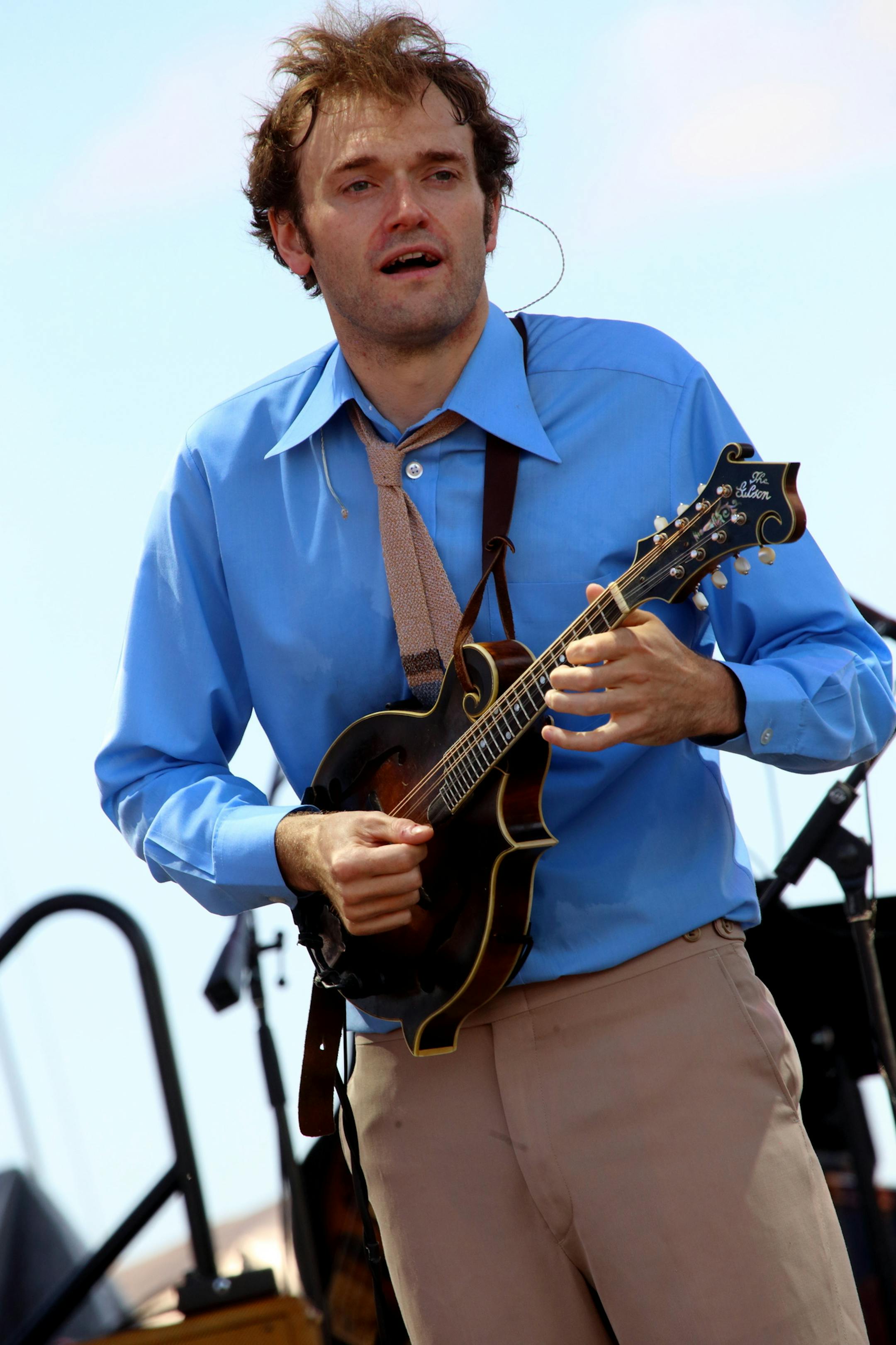 FILE - In this Sept. 7, 2013 file photo, Chris Thile and Punch Brothers performs on day 3 of the Lockn' Festival at Oak Ridge Farm in Arrington, Va. Thile, says hosting "A Prairie Home Companion" is like "getting to be Luke Skywalker." Thile will substitute for "Prairie Home" host and creator Garrison Keillor on the public radio show Saturday and Feb. 14 from the Fitzgerald Theater in St. Paul. (Photo by John Davisson/Invision/AP, File)