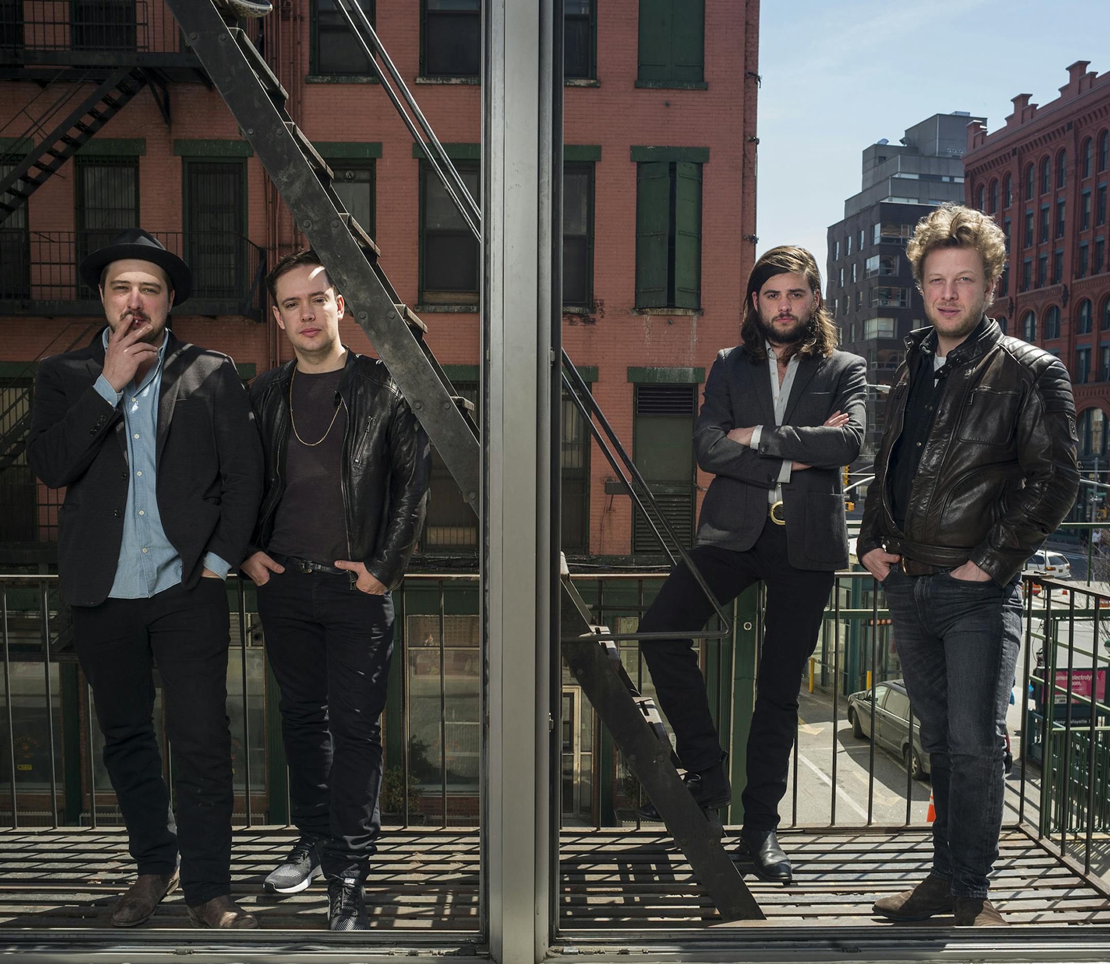 From left, Marcus Mumford, Ben Lovett, Winston Marshall and Ted Dwane of the band Mumford & Sons pose for a portrait in promotion of their forthcoming album "Wilder Mind" on Monday, April 6, 2015 in New York. (Photo by Drew Gurian/Invision/AP) ORG XMIT: INVW