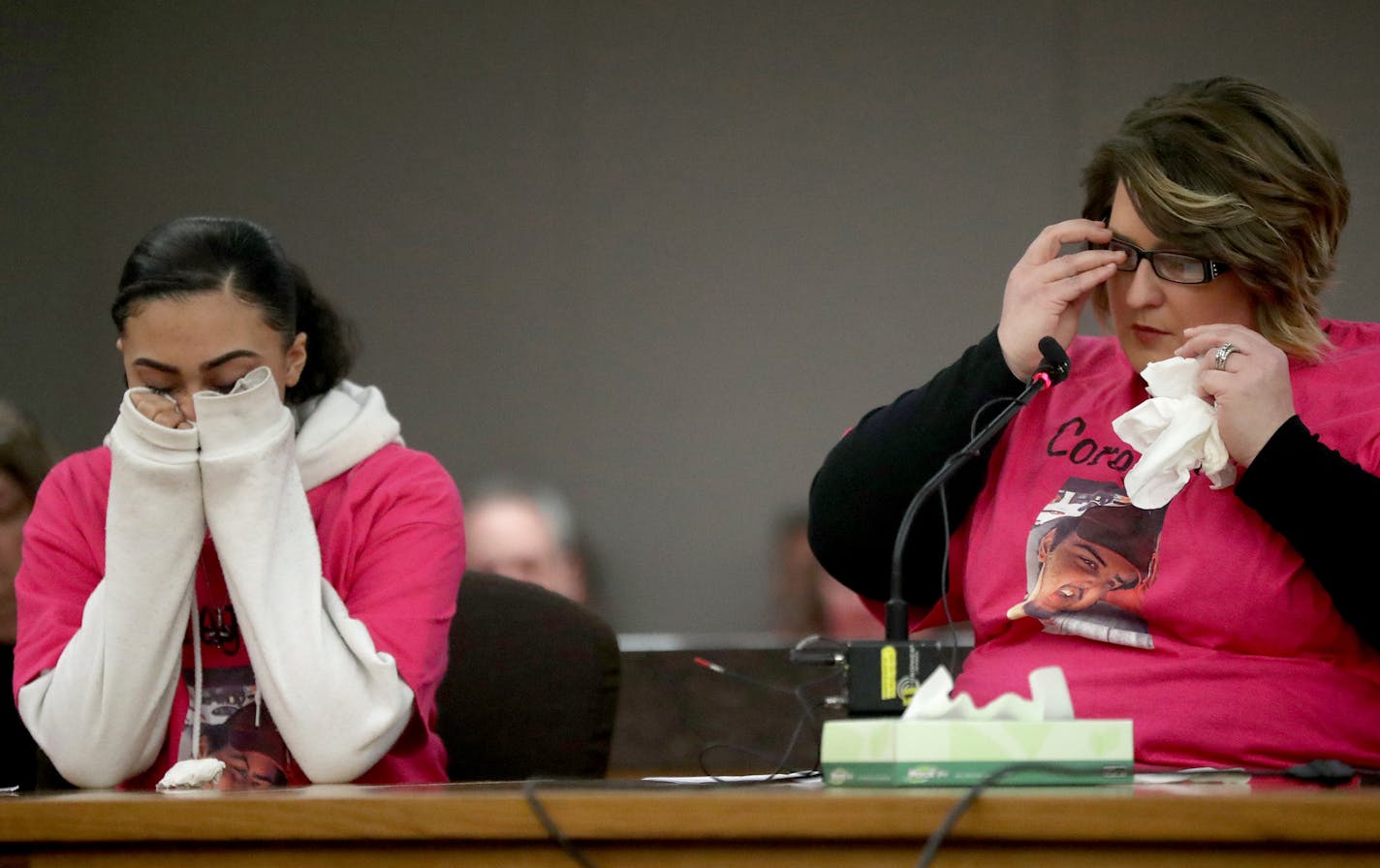 Five of six people involved in a robbery home invasion that resulted in one man being murdered were sentenced Friday, April 6, 2018, in Hennepin District courtroom of Judge Kerry W. Meyer in Minneapolis, MN. Here, the mother of 19-year-old murder victim Corey Elder, Bobbie Alhaqq, pauses to wipe her eyes as she reads her victim's statement to the court as her daughter, Jamaycia Mitchell, Elder's sister, sits to her left.] DAVID JOLES &#xef; david.joles@startribune.com Five of six people involved