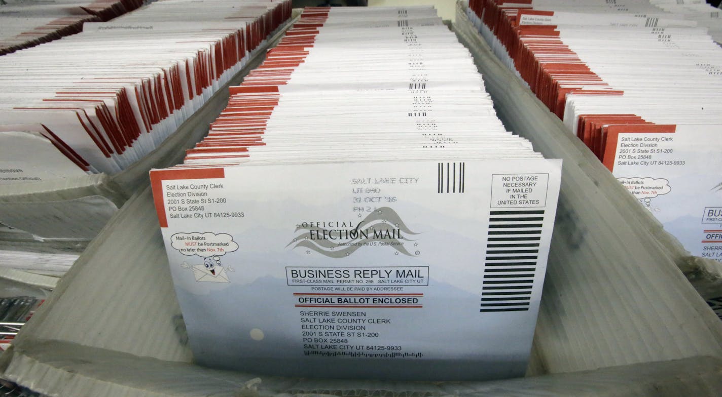 FILE - In this Nov. 1, 2016, file photo, mail-in ballots for the 2016 General Election are shown at the elections ballot center at the Salt Lake County Government Center, in Salt Lake City. As President Donald Trump rails against voting by mail, many members of his own political party are embracing it to keep their voters safe during the coronavirus outbreak. (AP Photo/Rick Bowmer, File)