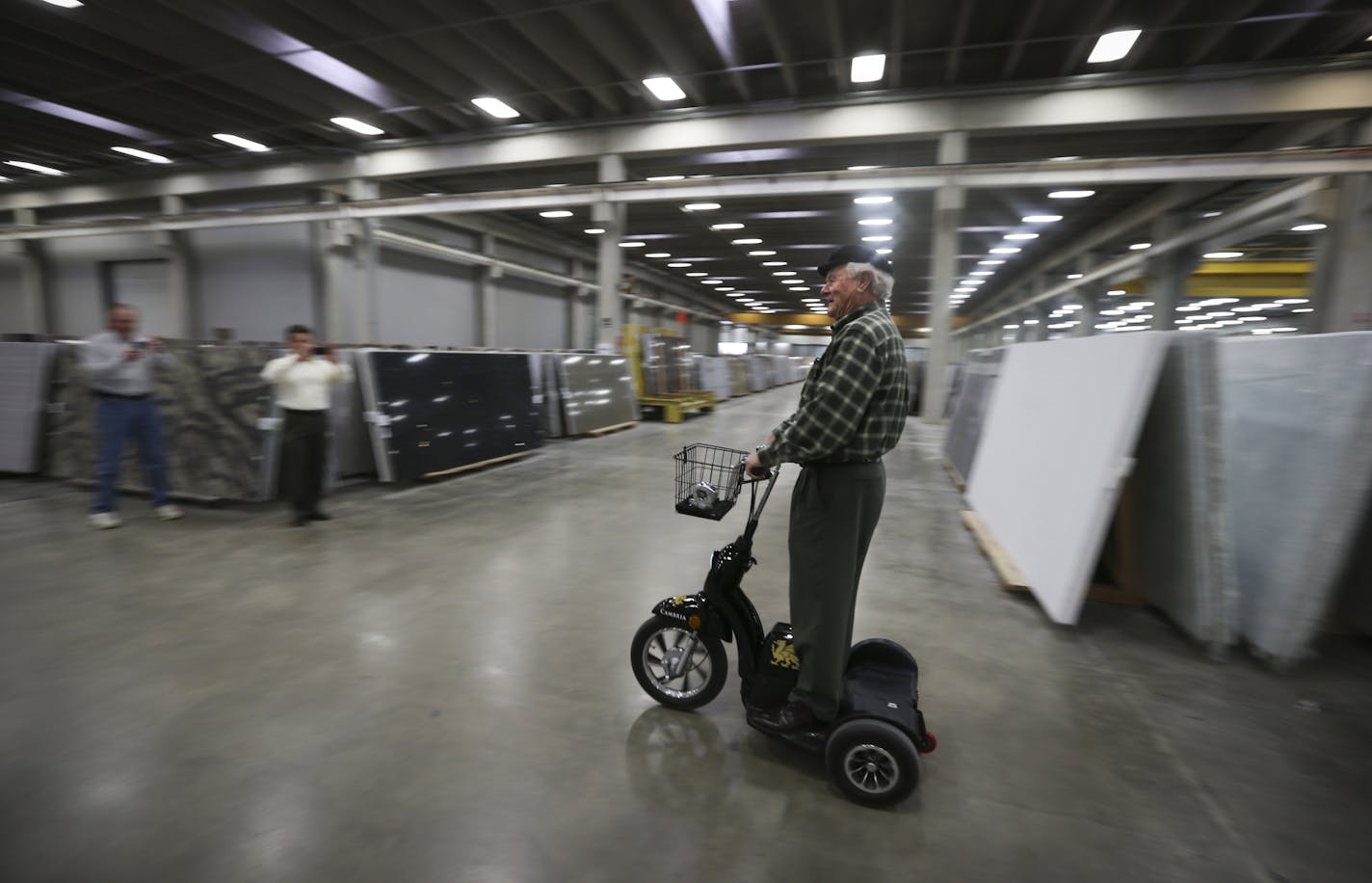 Mark Davis took a ride on an electric bike used to get around the factory floor at the Cambria production plant on Friday, October 17, 2014 in LaSueur, Minn. ] RENEE JONES SCHNEIDER &#x2022; reneejones@startribune.com