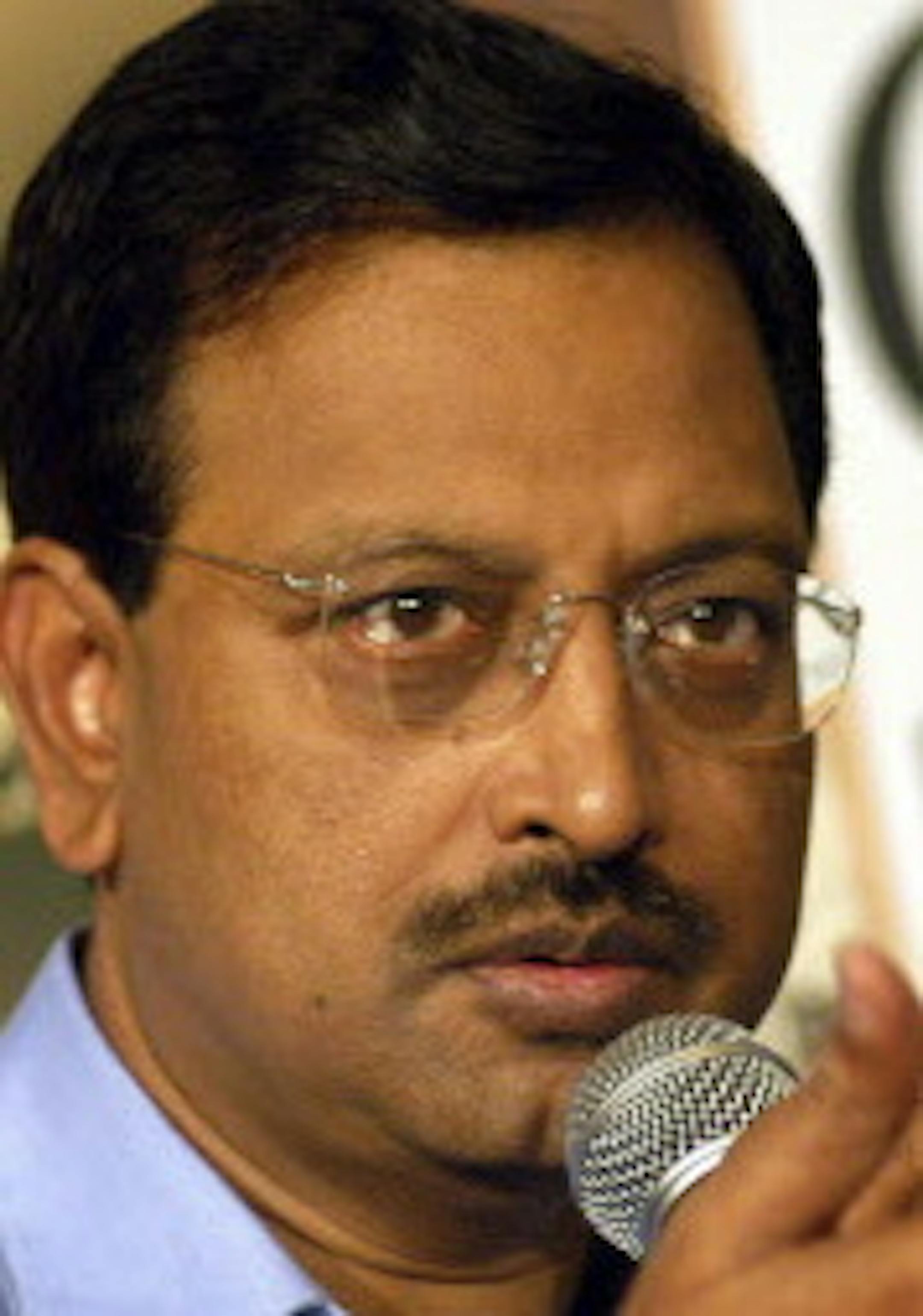 ** FILE ** This July 21, 2006 file photo shows the chairman of India's Satyam Computer Services Ltd. B. Ramalinga Raju addressing the media in Hyderabad, India. Raju quit Wednesday after admitting the company's profits had been inflated for several years, sending shares of the software services provider plunging by more than 70 percent. The plunge in Satyam shares dragged Bombay's Sensex index down nearly 6 percent to 9,728.74. (AP Photo/Mahesh Kumar A, File)