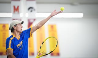 Wayzata's Collin Beduhn serves to Rochester Mayo's Tej Bhagra in the state Class 2A team tournament at the Baseline Tennis Center on the campus of the