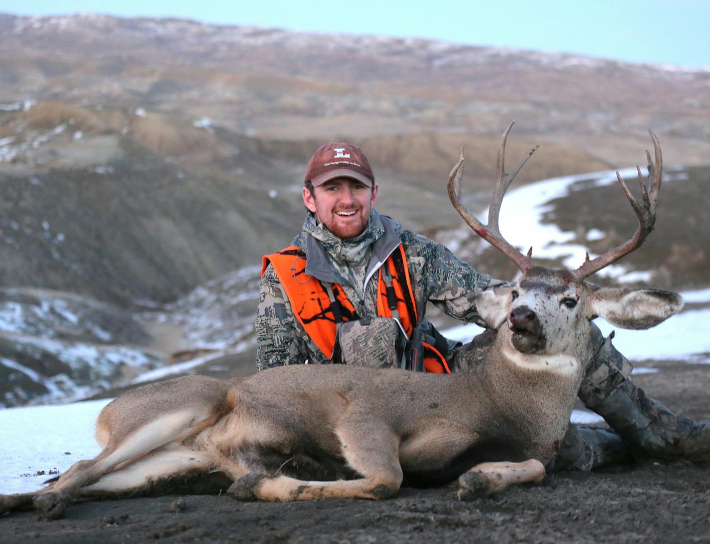 Trevor Anderson with a 4x4 mule deer taken in the badlands region of eastern Montana. The animal was packed out nearly 3 miles over rocky canyons, ravines, gullies and mesas.