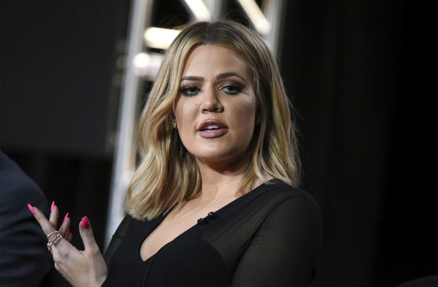 FILE - In this Jan. 6, 2016, file photo, Khloe Kardashian participates in the panel for "Kocktails with Khloe" at the FYI 2016 Winter TCA in Pasadena, Calif. Kardashian is calling her sister's robbery on Oct. 3, in Paris "a wake up call for everybody" but is pushing back against criticism that Kim Kardashian West had been too public in displaying her wealth.