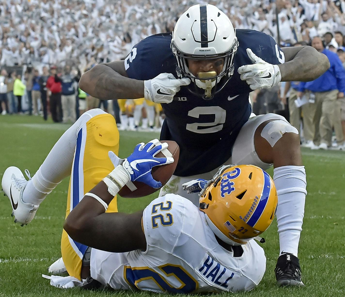 Penn State's Marcus Allen (2) looks down at Pitt's Darrin Hall after tackling him in the end zone for a safety in the fourth quarter on Saturday, Sept. 9, 2017, at Beaver Stadium in University Park, Pa. Penn State won, 33-14. (Matt Freed/Pittsburgh Post-Gazette/TNS) ORG XMIT: 1210742