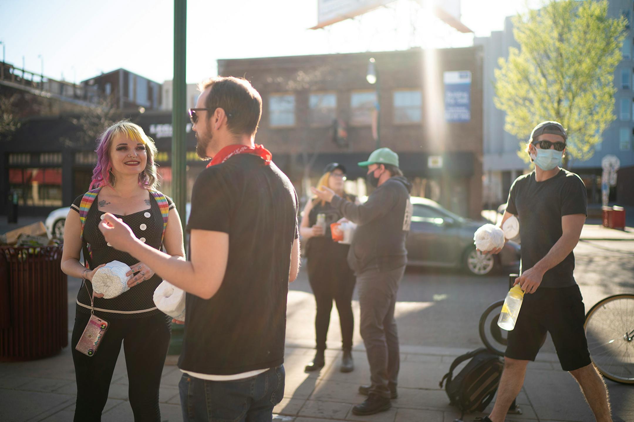 Muddy Waters customers and former employees visited on the sidewalk outside the restaurant on Lyndale Ave. S. It was an emotional scene at Muddy Waters early Sunday afternoon, May 3, 2020 as loyal customers and former employees mingled on the last day of service at the beloved bar and restaurant in the Lyn-Lake area.