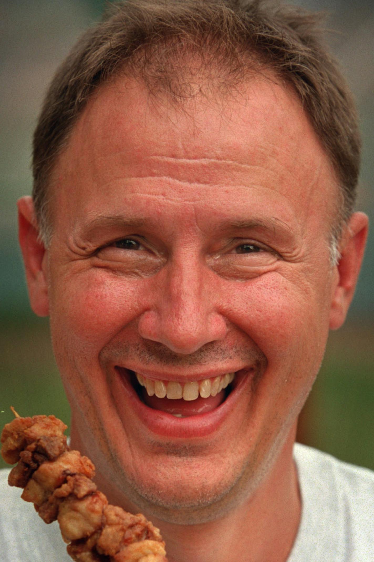 GENERAL INFORMATION: MINNESOTA STATE FAIR, ARDEN HILLS: AUGUST 23, 2000 through SEPTEMBER 4, 2000: IN THIS PHOTO: Tim &#xcf;Giggles&#xd3; Weiss holds one of the newest food offerings at the fair this year: Surf-n-turf, a stick filled with walleye and tenderloin tip pieces. It&#xcc;s one of several northwoods-themed offerings at Giggles&#xcc; Campfire Grill, a new concession located on Machinery Hill. Weiss, who owns Gabe&#xcc;s by the Park restaurant in St. Paul, has been to the fair every one o