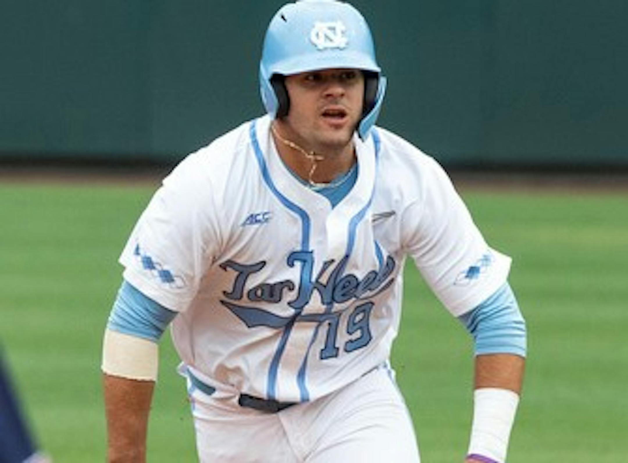 North Carolina's Aaron Sabato (19) rounds second base against Auburn during Game 1 at the NCAA college baseball super regional tournament in Chapel Hill, N.C., Saturday, Jun 8, 2019. (AP Photo/Ben McKeown) ORG XMIT: NCBM121