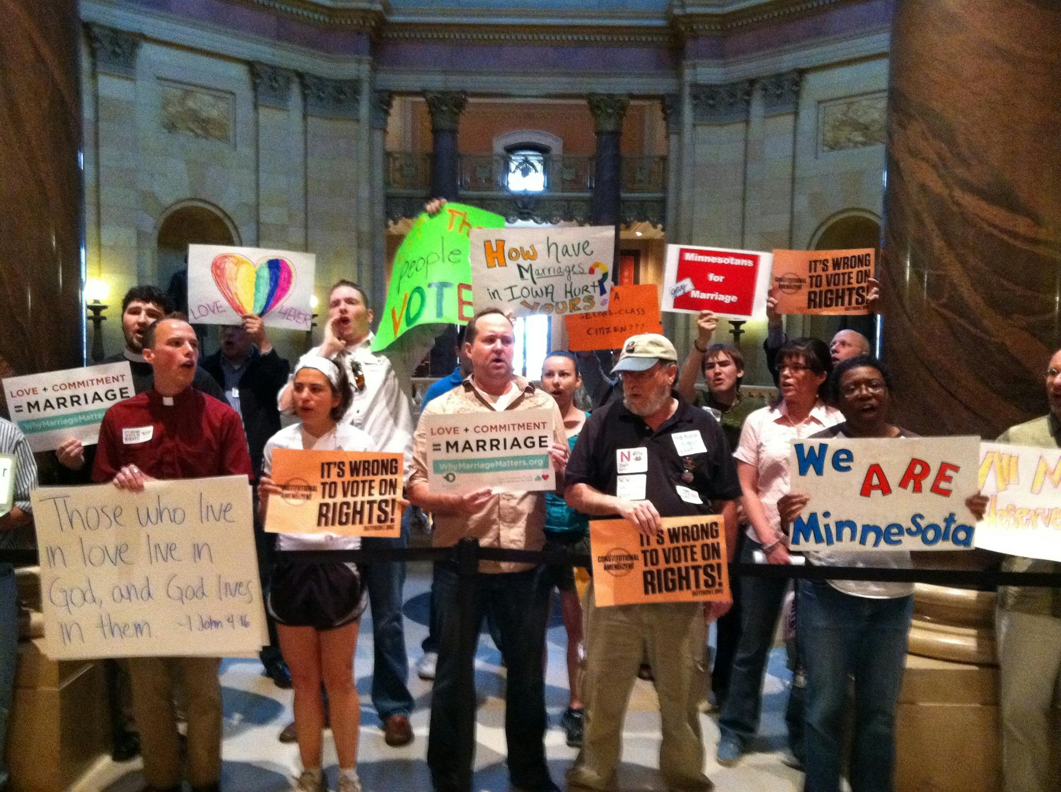 Opponents of the proposed constitutional amendment that would ban same-sex marriage rallied at the State Capitol Friday morning.