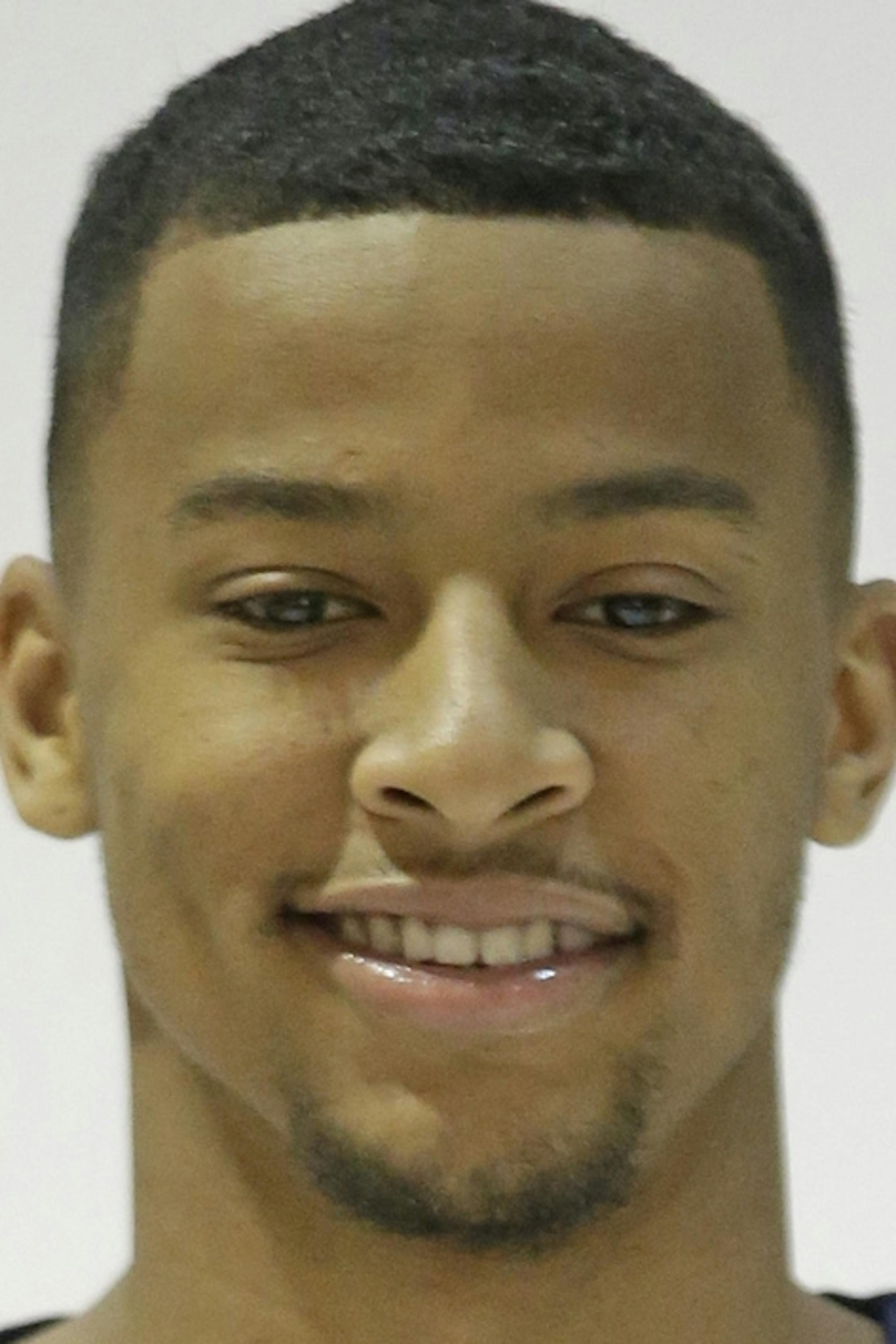 In this Monday, Sept. 29, 2014, photo, Utah Jazz's Trey Burke poses for a photo during the NBA basketball media day, in Salt Lake City. (AP Photo/Rick Bowmer) ORG XMIT: OTKRB139
