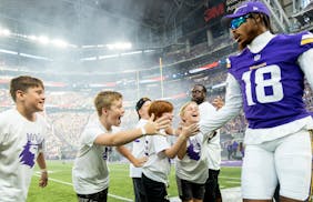 Vikings receiver Justin Jefferson greeted young fans before the team’s preseason game against Tennessee last month. 