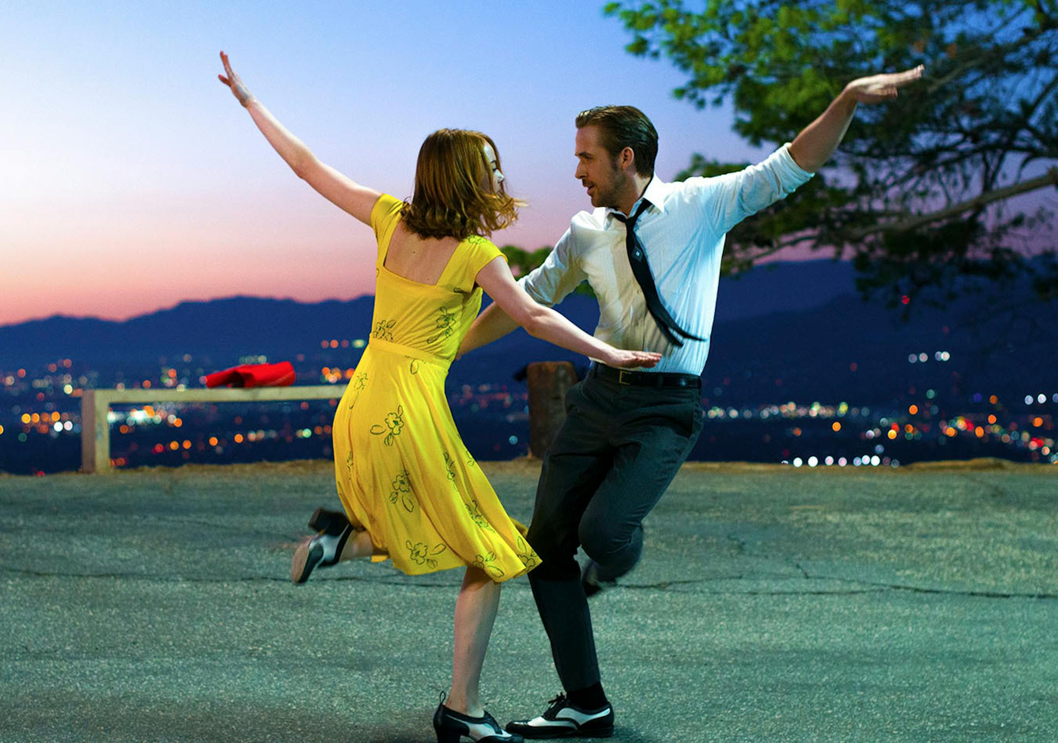 This image released by Lionsgate shows Ryan Gosling, right, and Emma Stone in a scene from, "La La Land."