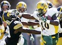 North Dakota State running back Lance Dunn, right, breaks a tackle by Iowa defensive back Miles Taylor, left, during the second half of an NCAA colleg
