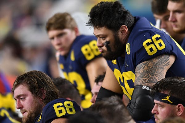 Chuck Filiaga, foreground, finished his Michigan career with a loss Dec. 31 in the College Football Playoff semifinals against Georgia.