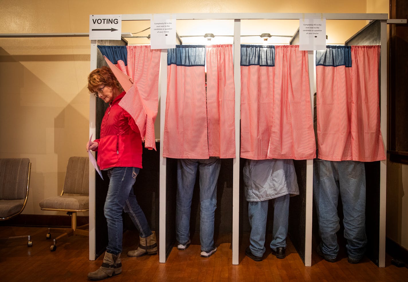 Minnesotans seen voting on Election Day 2018.