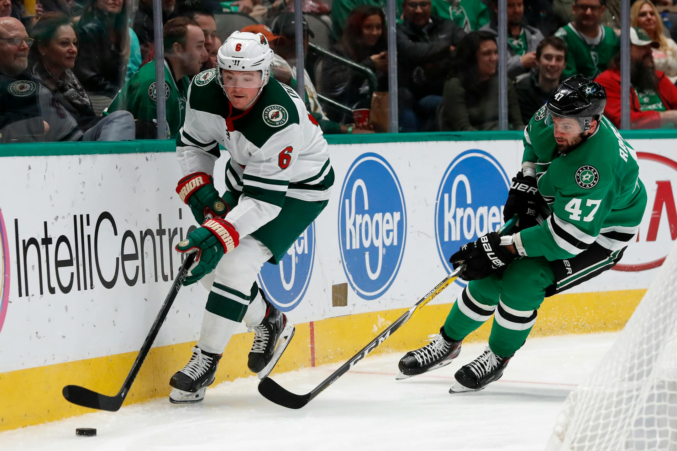Wild center Ryan Donato controls the puck as Dallas right wing Alexander Radulov gives chase in the second period
