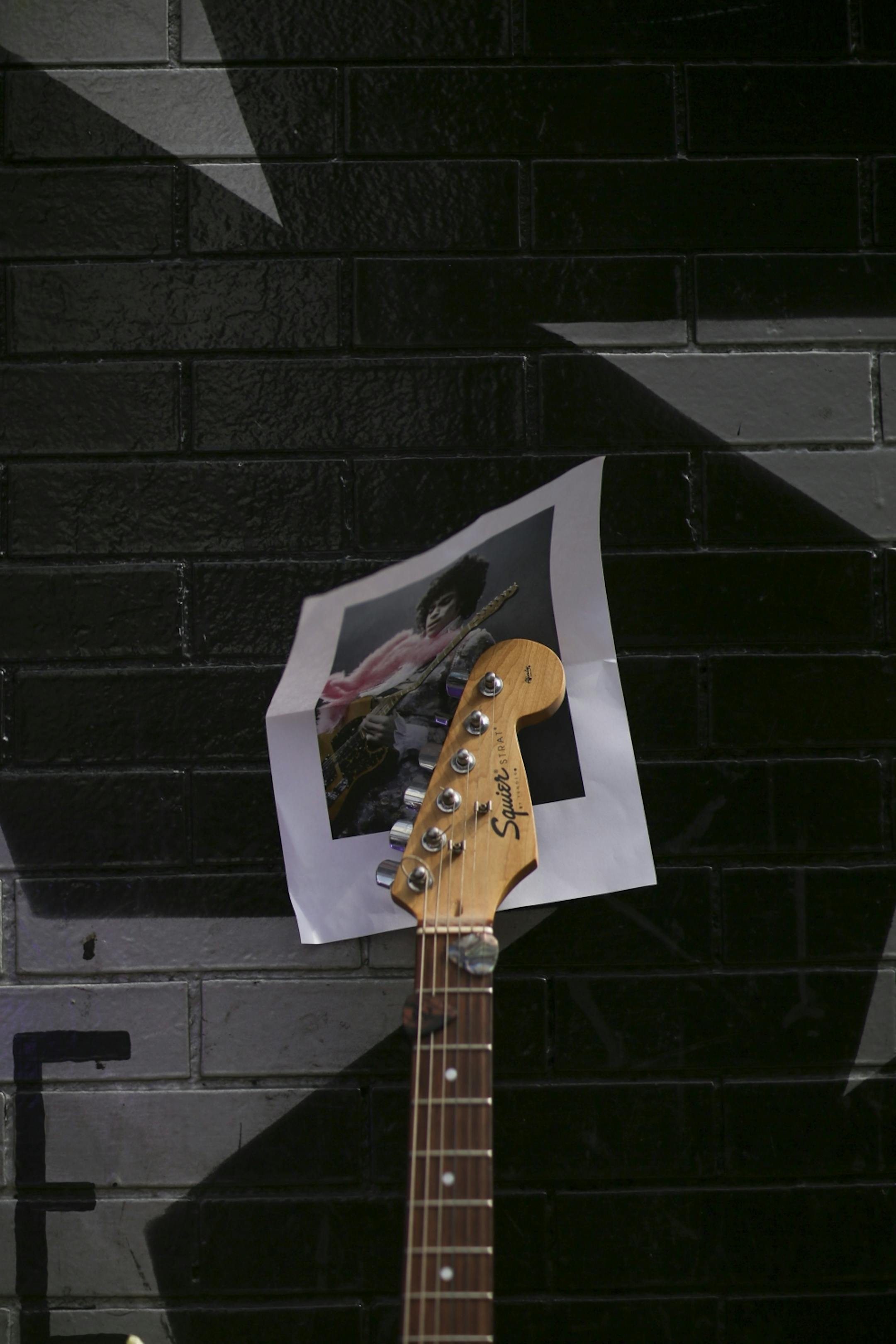 A guitar left by a fan outside First Ave. Tuesday afternoon.