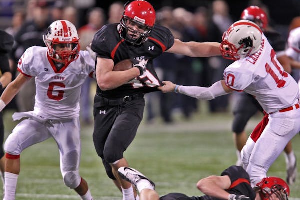 Linebacker Jack Cottrell returned a ball after intercepting a pass in the Class 6A Prep Bowl against Lakeville North.