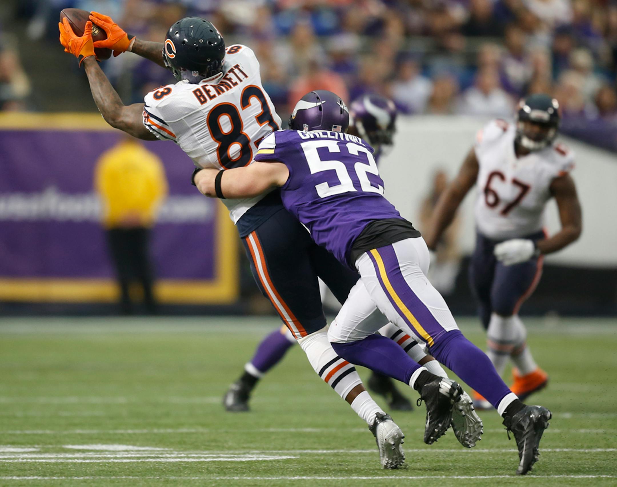Minnesota Vikings outside linebacker Chad Greenway (52) tackled Bears tight end Martellus Bennett (83) to break up a pass from quarterback Josh McCown (12) in the second quarter. ] MCKENNA EWEN · mckenna.ewen@startribune.com Minnesota Vikings and Chicago Bears - Mall of America Field in Minneapolis, Minn. - 12/01/2013