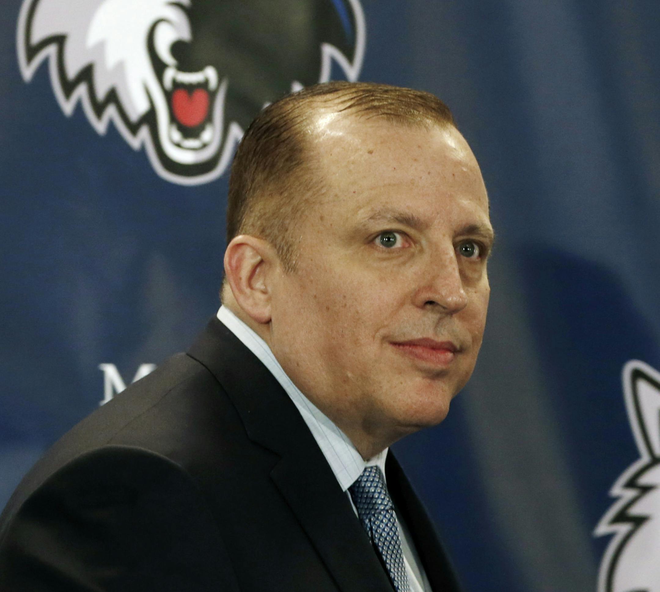 Tom Thibodeau walks onto the platform to be introduced as the new Minnesota Timberwolves NBA basketball head coach Tuesday, April 26, 2016, in Minneapolis. (AP Photo/Jim Mone)