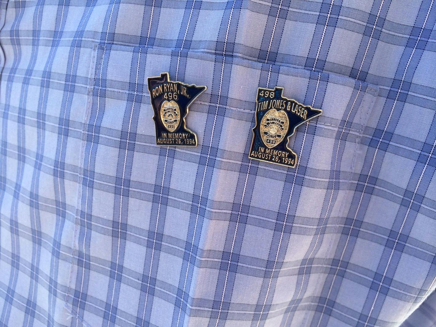 Ron Ryan Sr. wears pins on his shirt in memory of his son and other fallen officer Tim Jones.