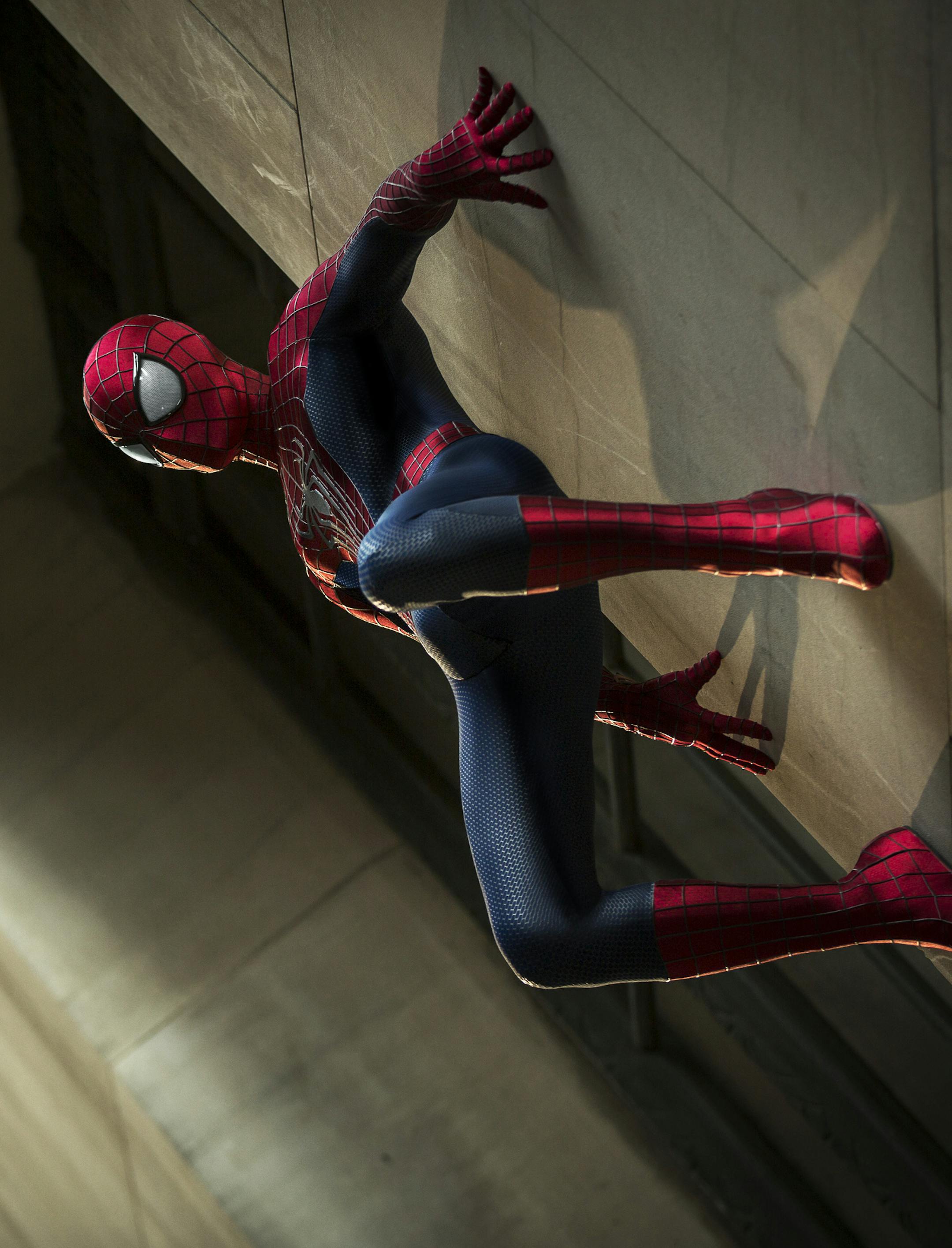In this publicity photo released by Sony Pictures Entertainment, Andrew Garfield stars as Spider-Man in Columbia Pictures' "The Amazing Spider-Man 2." The Spider-Man franchise will detour next with a ìSinister Sixî spinoff in 2016, pushing ìThe Amazing Spider-Man 3î to 2018. Sonyís Columbia Pictures announced its updated schedule for the web-slinger Wednesday, July 23, 2014. By ordering ìSinister Sixî ahead of the next ìSpider-Manî movie, the studio h