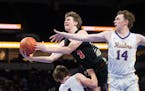 Farmington’s Ryan Beckwith (3) is called for a charge after running over Cretin-Derham Hall guard Miles Bollinger while being pursued by guard Aidan