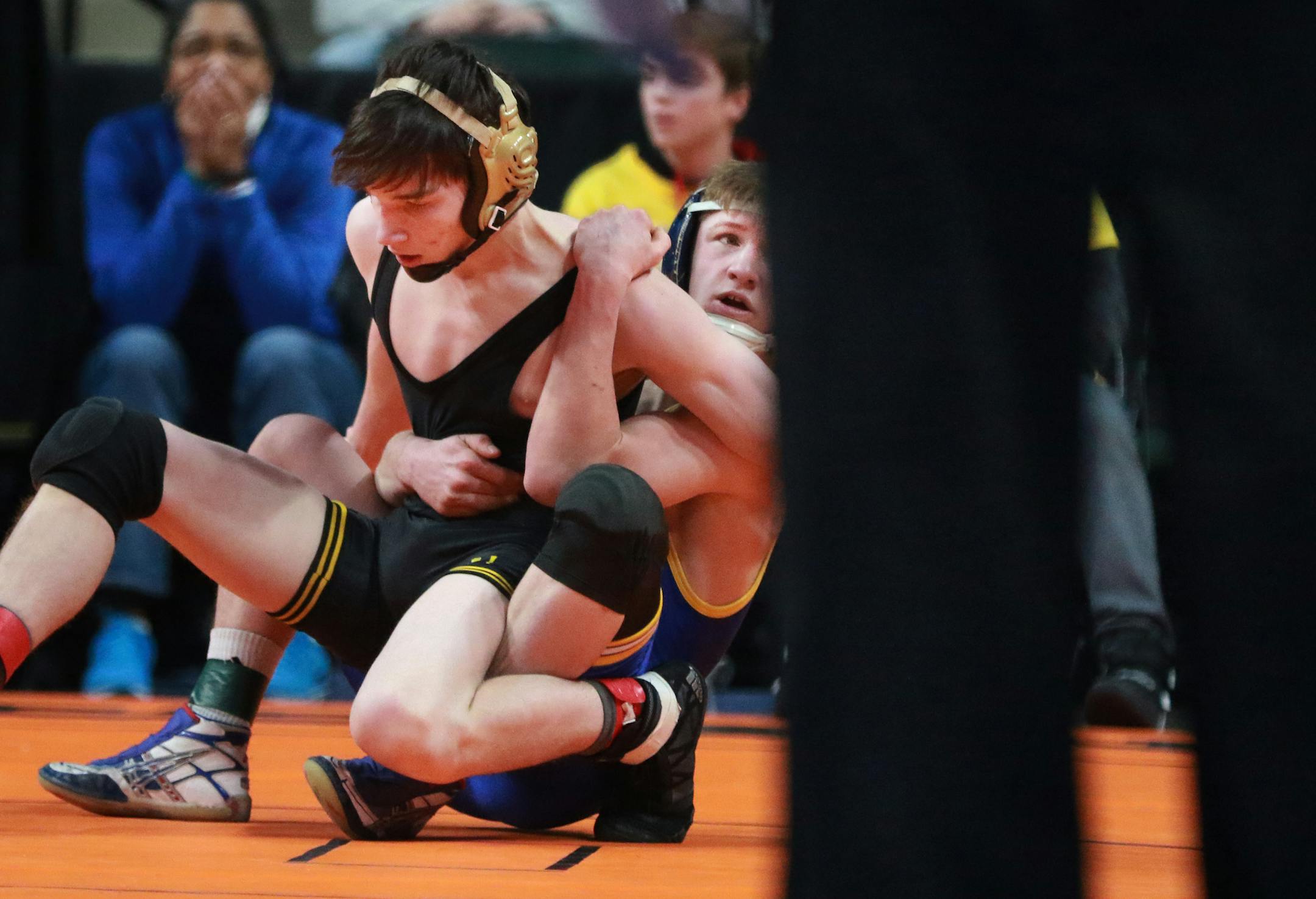 Patrick McKee of St. Michael-Albertville, right, controlled Brady Gross of Apple Valley (David Joles/Star Tribune)