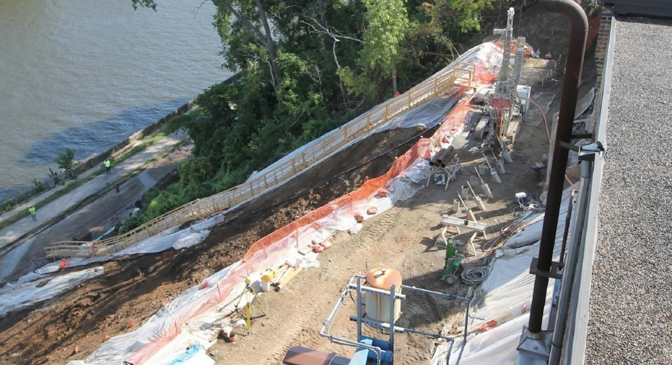 Repairs intended to stabilize the slope above West River Parkway are occurring on a steep slope with fragile geology.