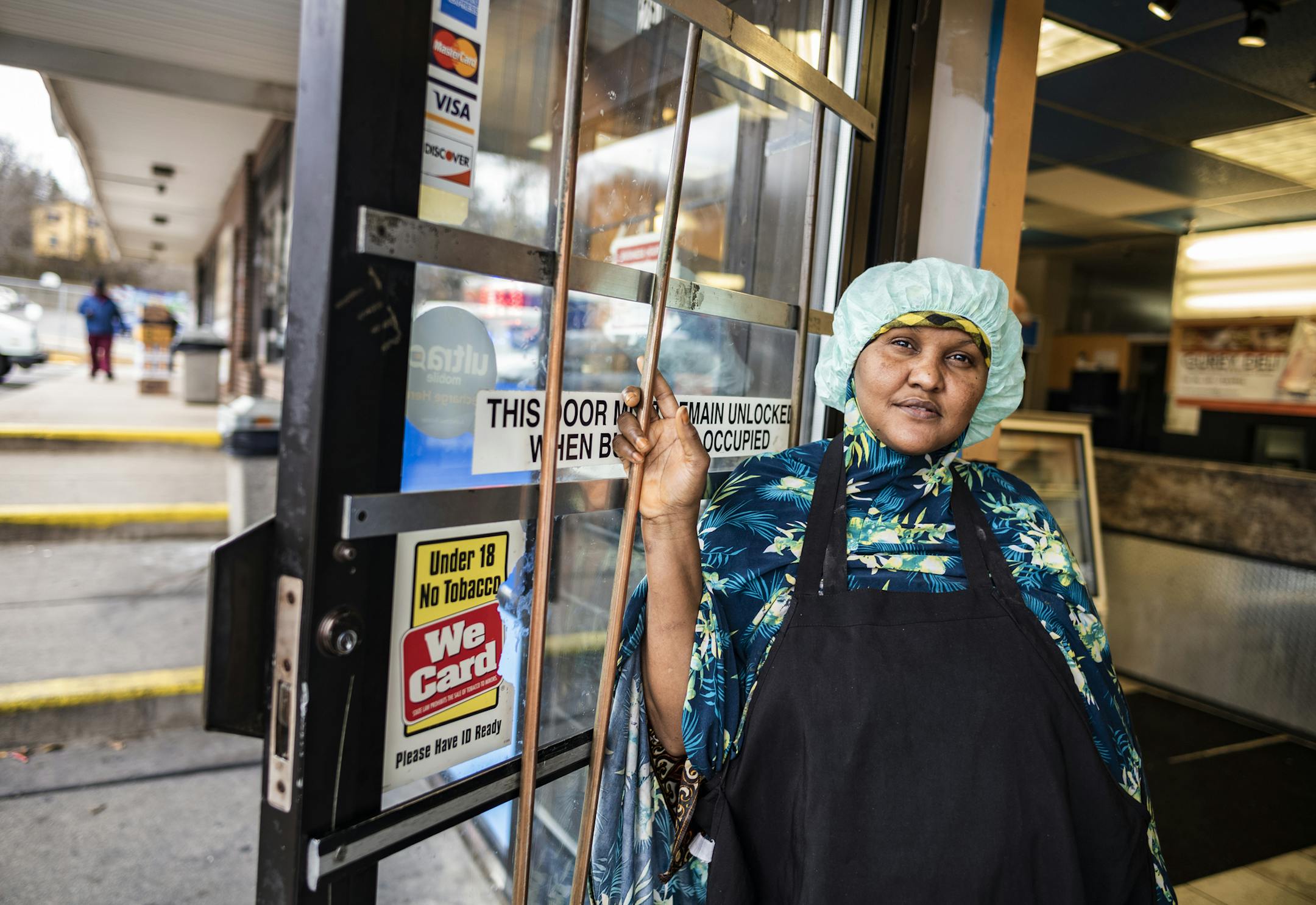 Lola Mohamed is glad to be cooking for people at the Gurey Deli. Water and sewer line problems forced St. Paul officials Aug. 30 to condemn Shamrock Plaza, threatening the future of several immigrant-owned businesses serving a multicultural and largely low-income community. RICHARD TSONG-TAATARII ¥ richard.tsong-taatarii@startribune.com