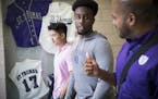 Future Dougherty Family College students Brian Ngo and Zakaria Elmi chat with dean Alvin Abraham during a tour Friday. The new two-year school at the 